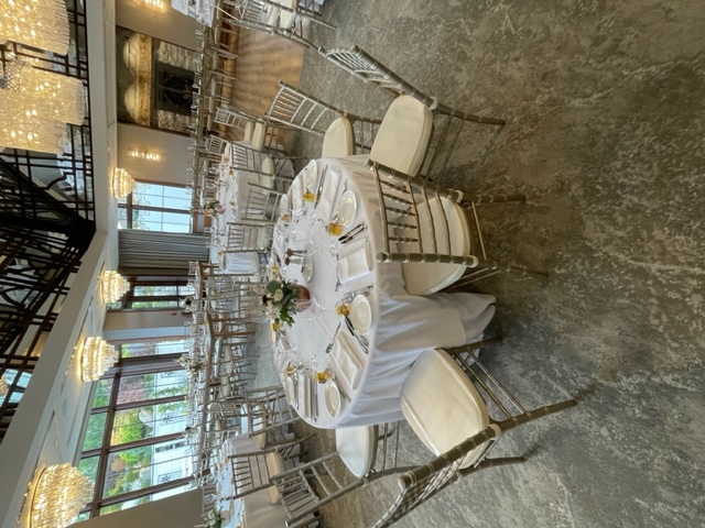 Event decor detail with flowers and lighting