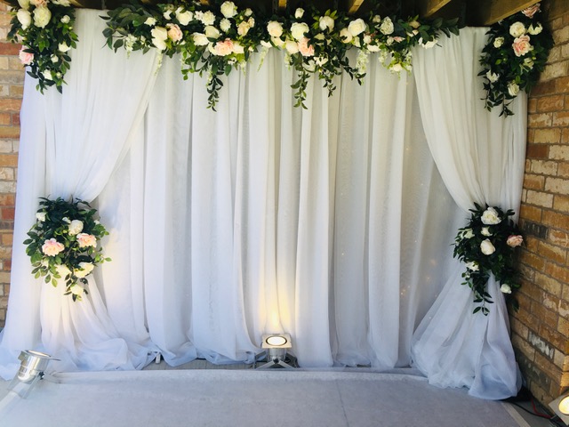 Event decor with floral fabric accents